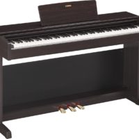 Dark rosewood Arius traditional console digital piano with bench