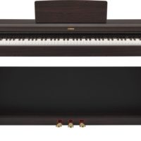 Dark rosewood Arius traditional console digital piano with bench