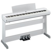 88-key white digital piano with polished white accents.